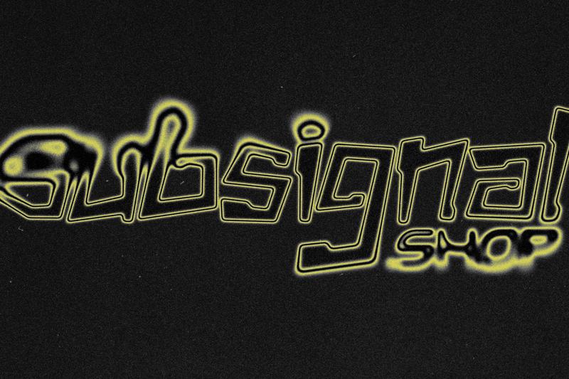 A lime neon outline melting on black film grain