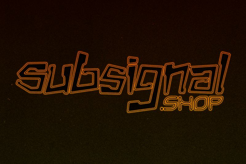 A dim orange neon outline on a brown dusk gradient