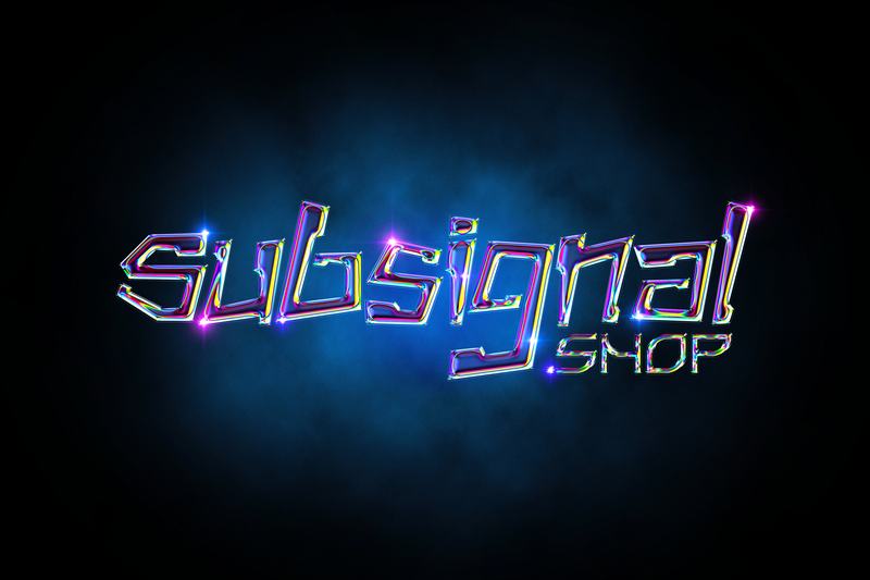 Rainbow holographic glass letters on a blue haze