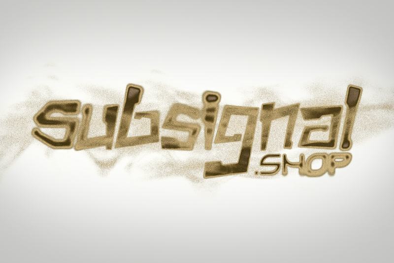 Gold letters dissolving into drifting sand