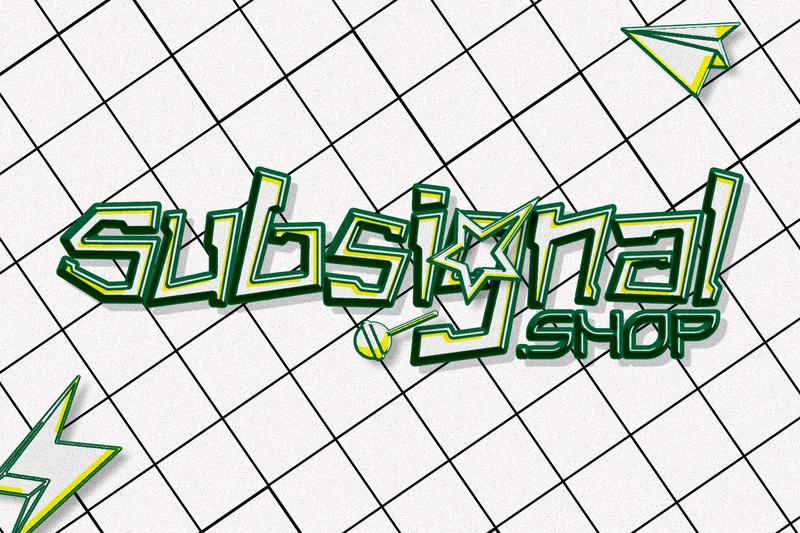 Green sticker-outline letters on grid paper with paper-plane and lightning doodles
